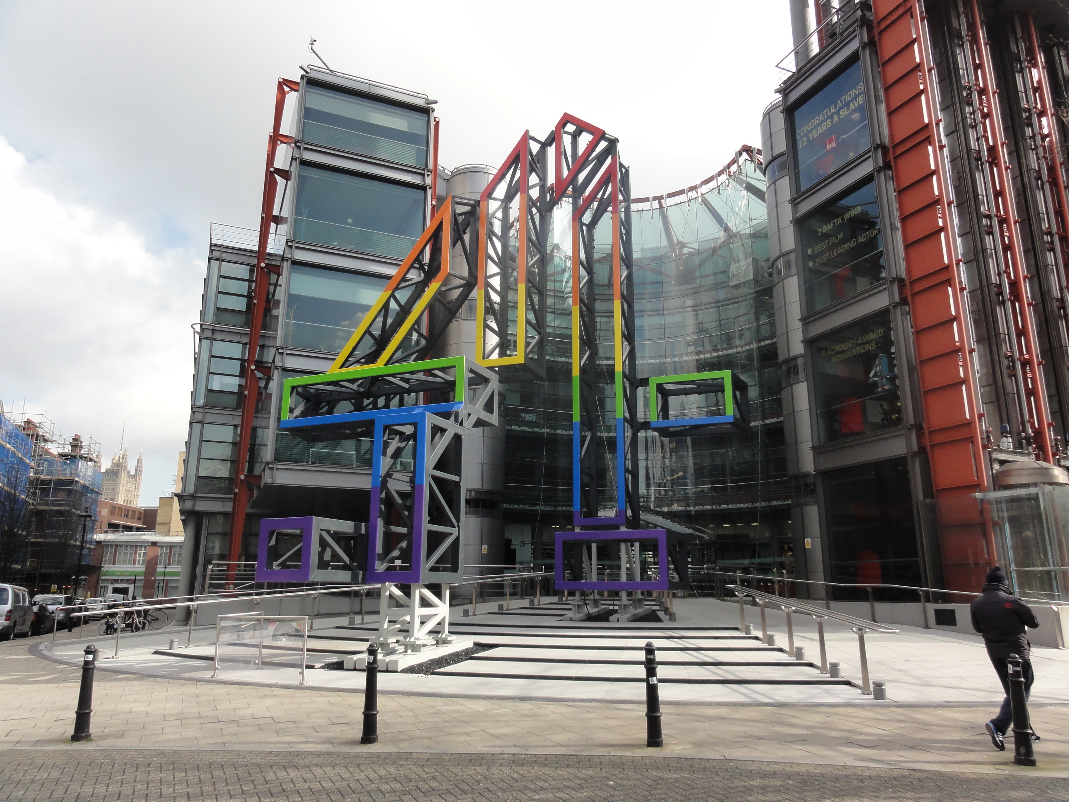 A picture from outside the Channel 4 building. A huge multi coloured 4 covers the front door
