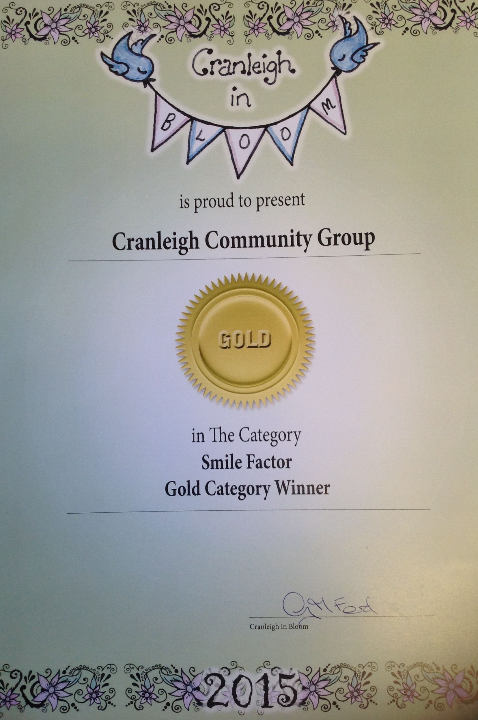 Certificate of achievement that was awarded to the Cranleigh Community Group for Gold in the category of 'Smile Factor'